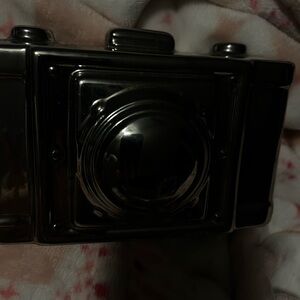 Silver desk top camera sculpture